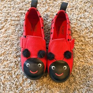 TOMS Kids Red and Black Ladybug Slippers